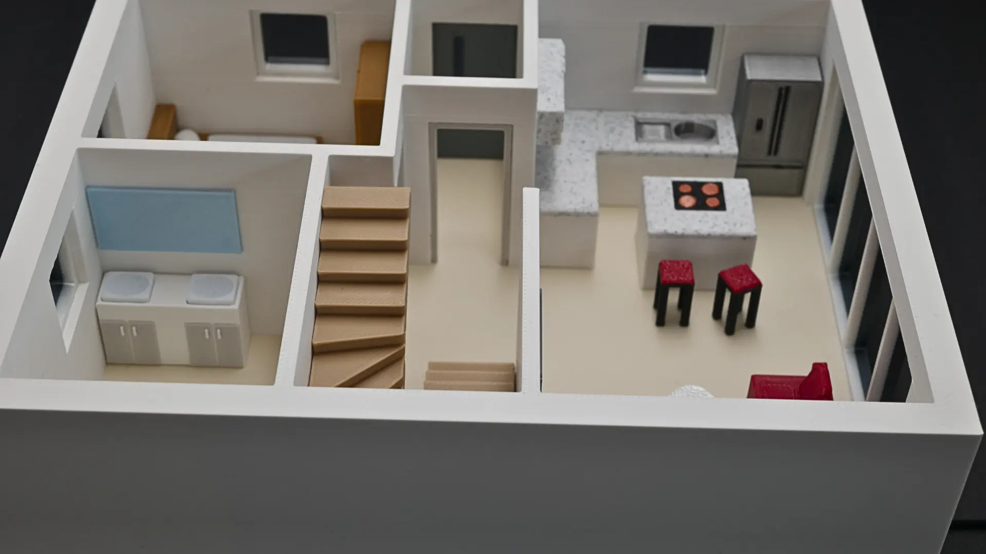 Gesamte Wohnebene im 3D-Modell mit Bett, Kueche und Sofa
